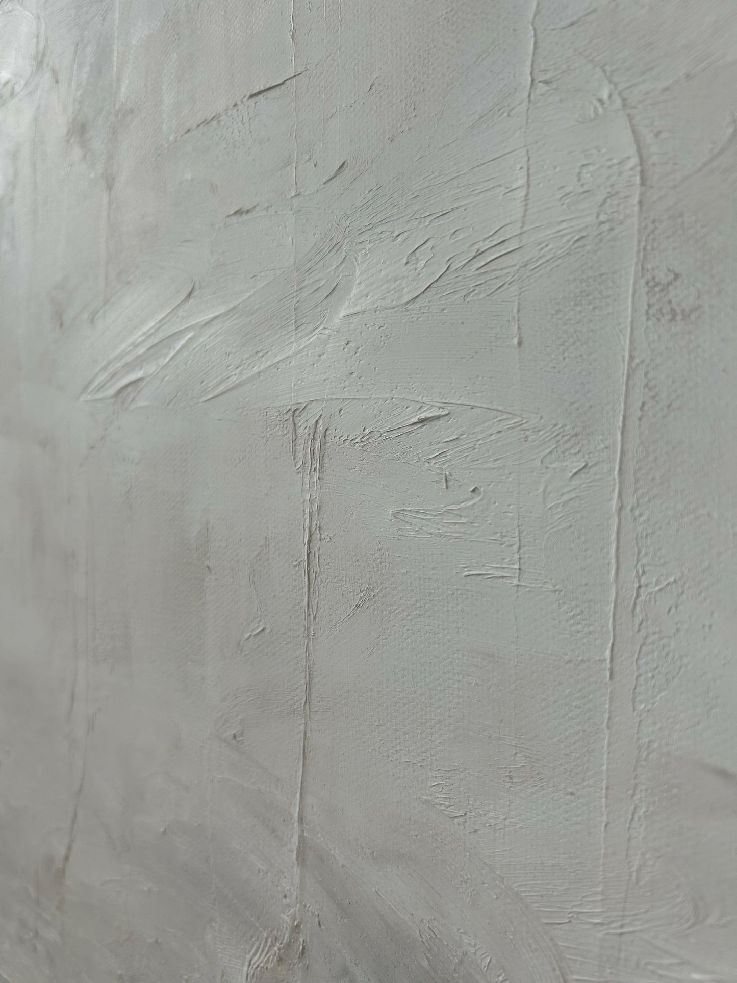 ‘Innocence’ – Close-up of textured white and beige abstract artwork, highlighting subtle movement and delicate layering – Caroline Adrienne Art