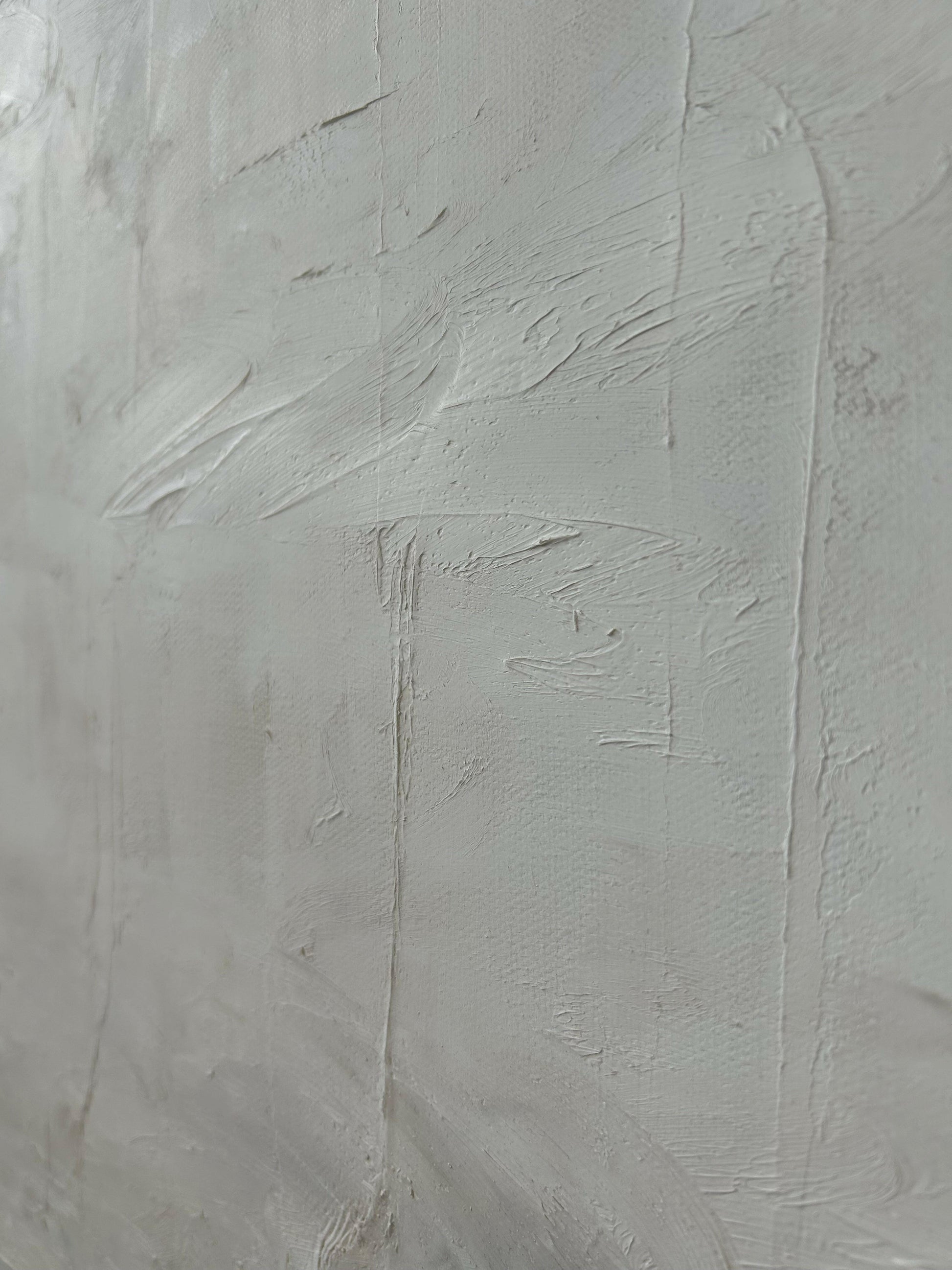 ‘Innocence’ – Close-up of textured white and beige abstract artwork, highlighting subtle movement and delicate layering – Caroline Adrienne Art