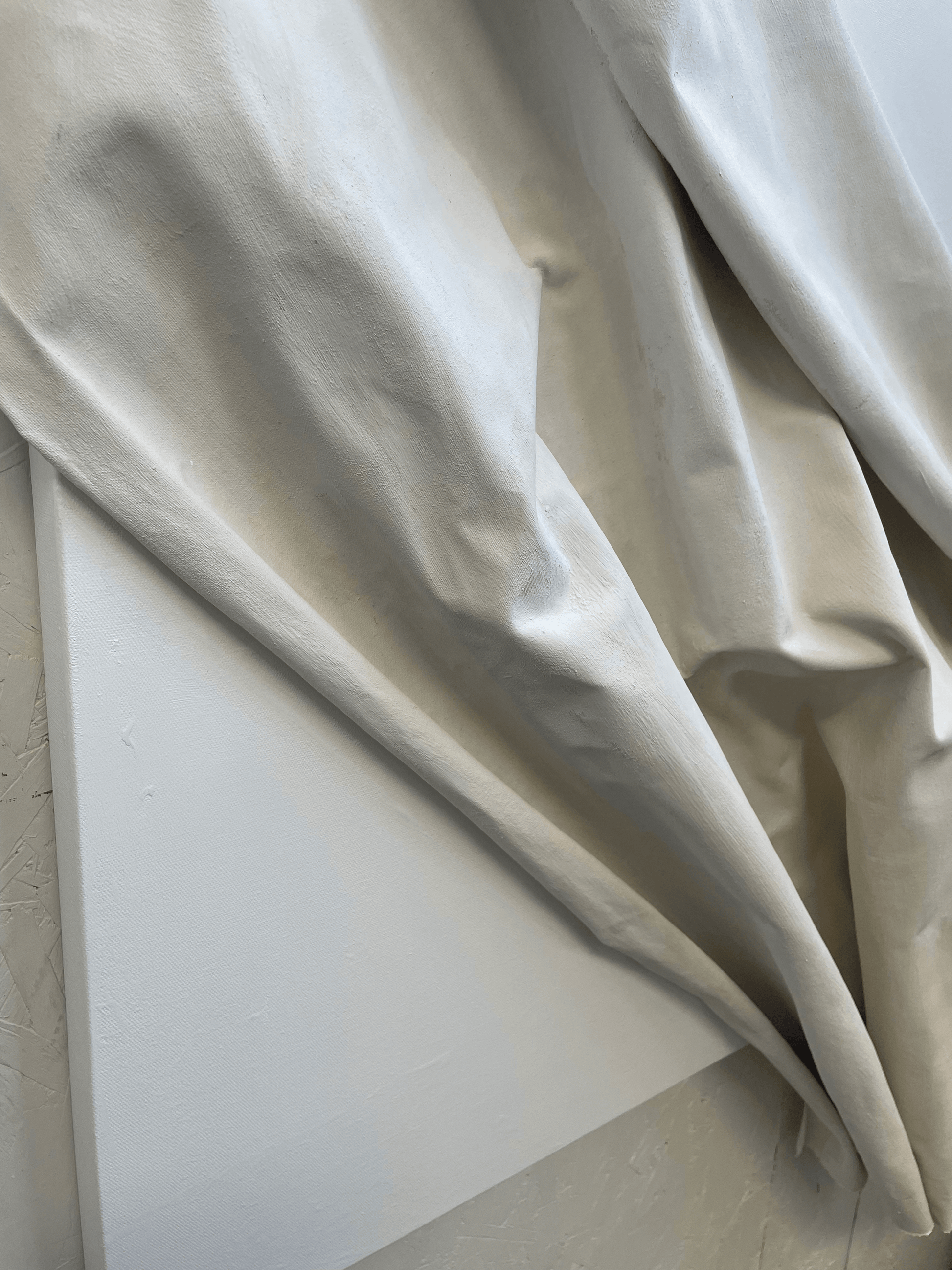 Exclusive 3D mixed media abstract art with neutral tones, combining plaster elements and luxurious texture for contemporary spaces. Close-up side