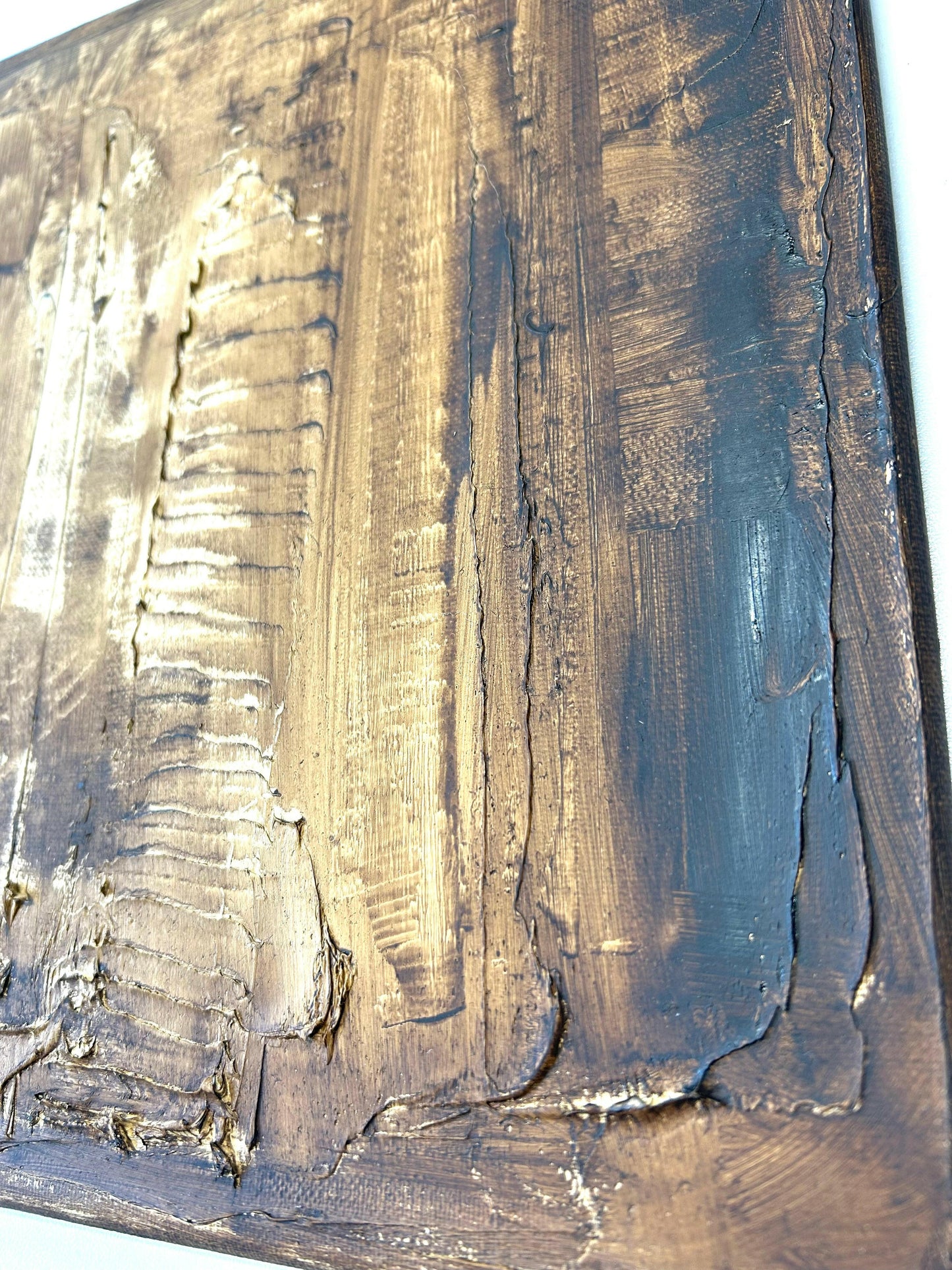 close up of brown abstract painting using oil paints