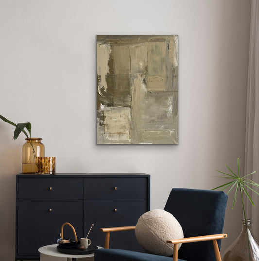 Modern living room with textured abstract art Greener Pastures by Caroline Adrienne Art, black dresser, and blue chair.