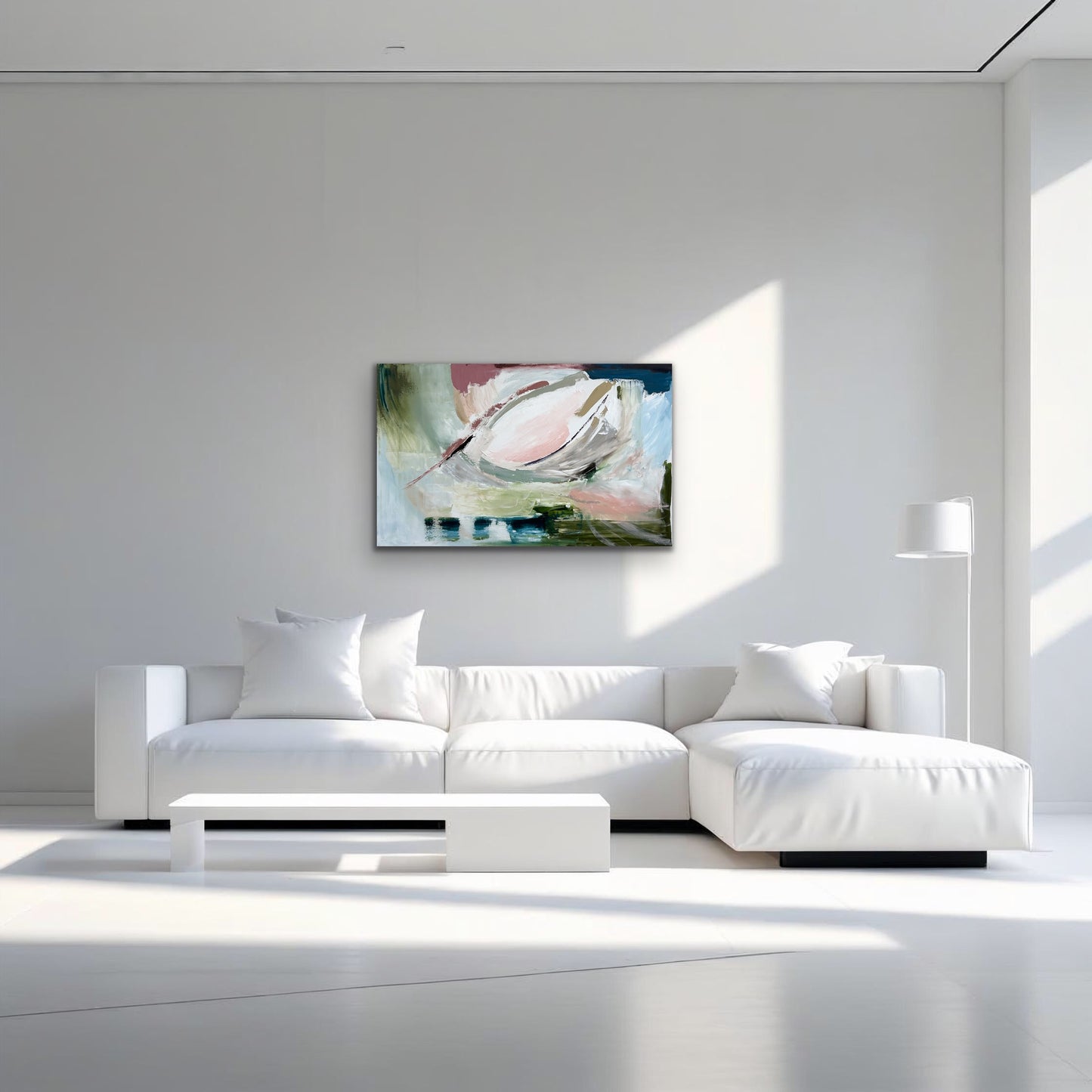 Modern white living room with a sectional sofa and abstract painting on the wall.
