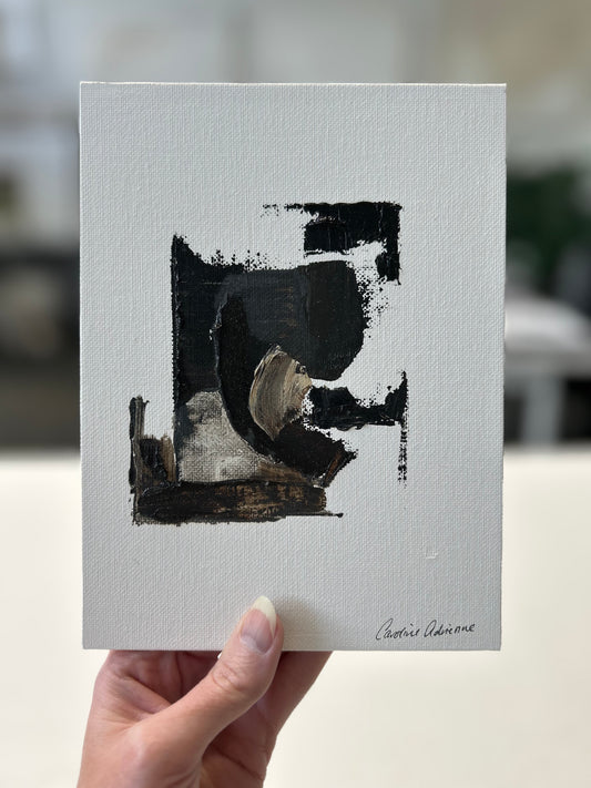 A set of three small abstract paintings, featuring a soft blend of neutral tones and minimalistic texture, perfect for compact spaces or smaller interiors.