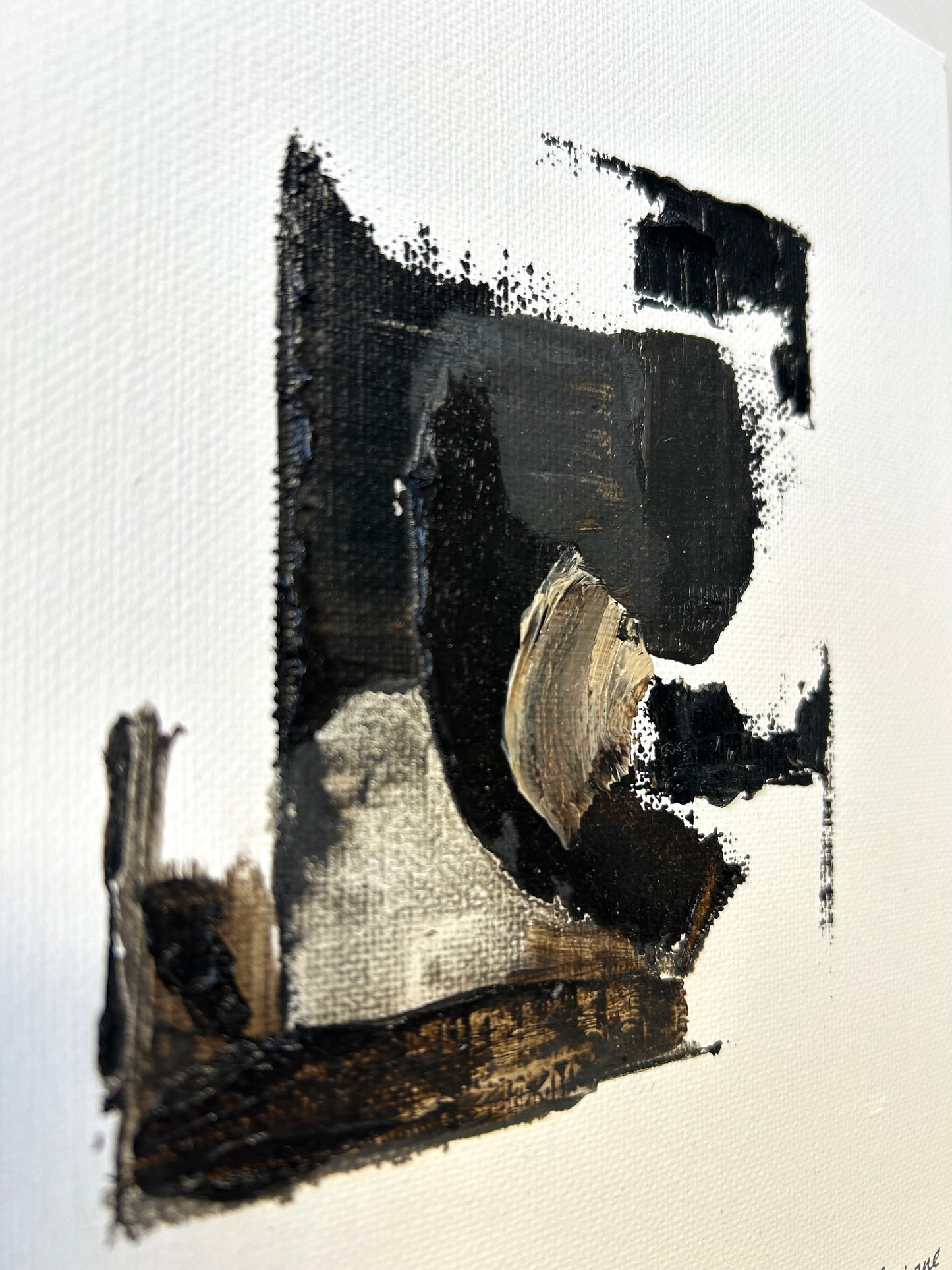 close up of an abstract painting by Caroline Adrienne Art featuring shades of black, brown, and white