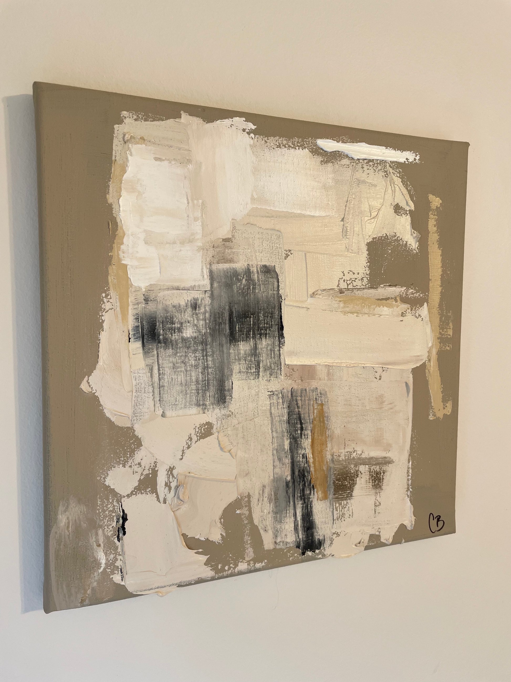 Abstract art painting on a beige background