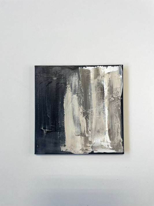 Abstract art piece with black and white brush strokes on a white background Caroline Adrienne Art