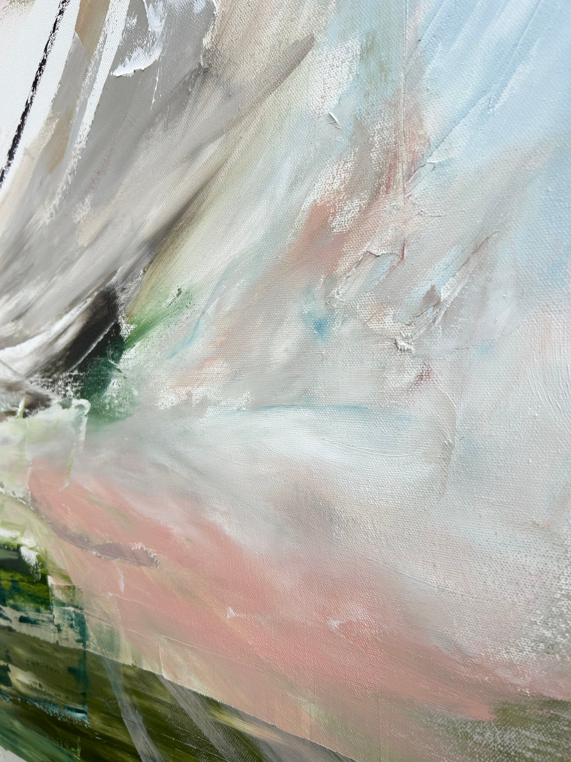 Close-up of a textured surface with white, pink, and green colors