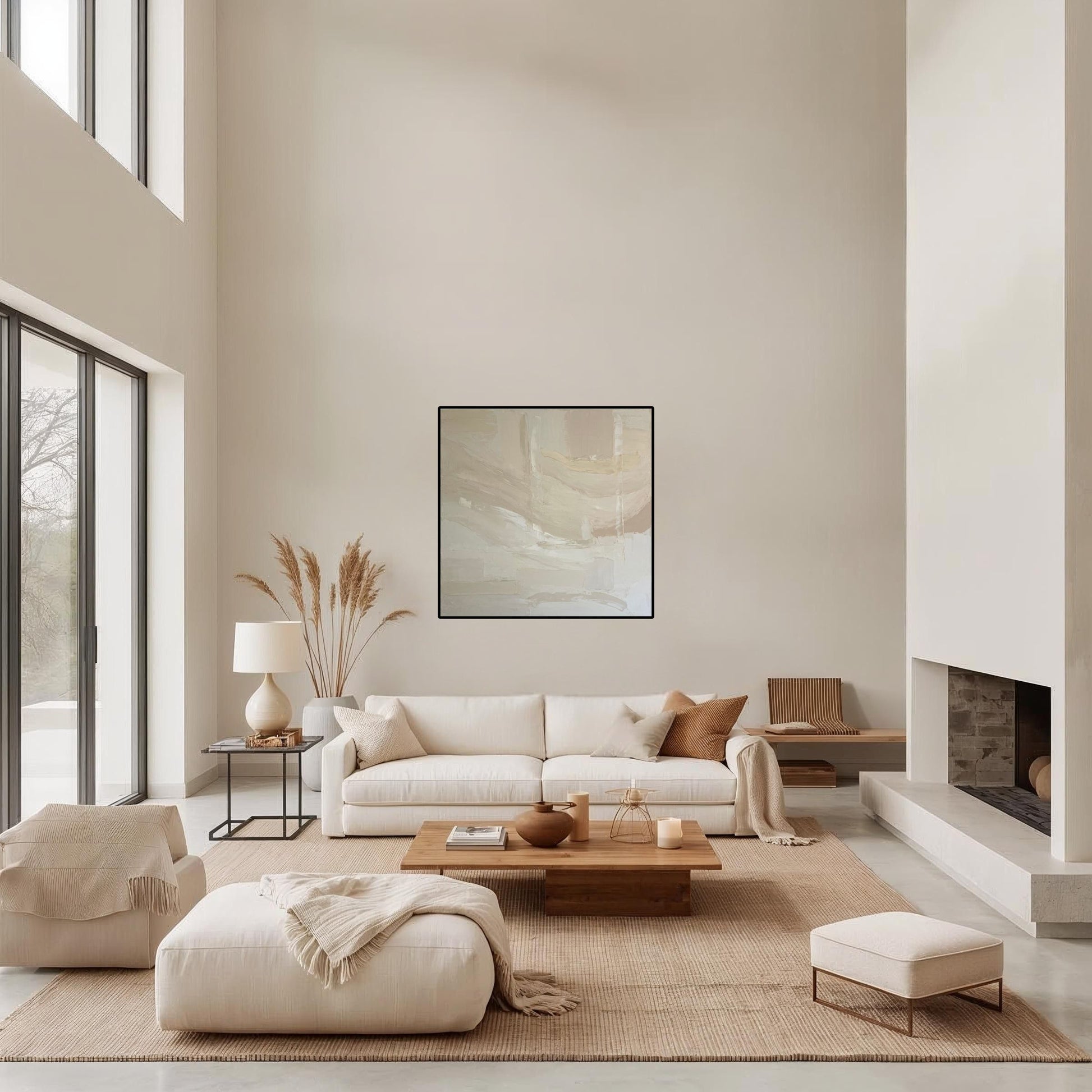 Modern living room with white sofa, wooden coffee table, and abstract art on wall.