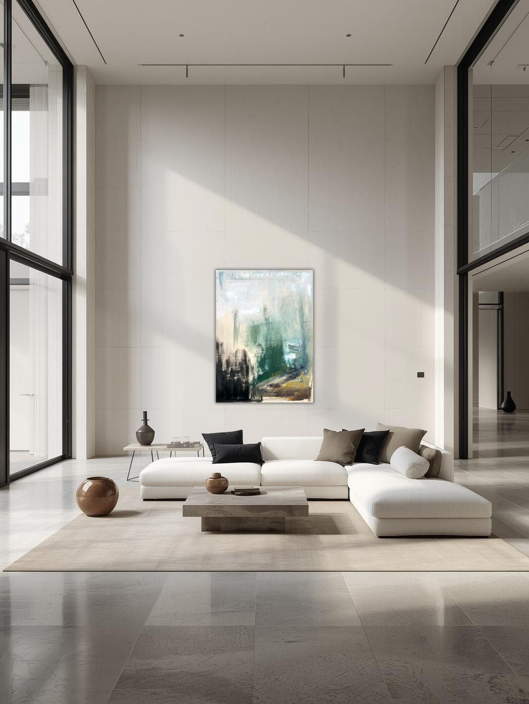 Modern living room with a white sofa, coffee table, and decorative items including Taking Up Space by Caroline Adrienne Art.