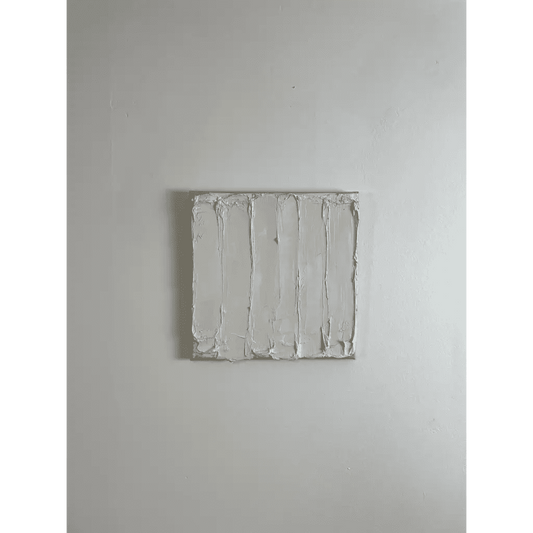 Athena: A crisp, white abstract artwork with tactile texture, characterized by subtle layering and a refined, minimalist aesthetic.