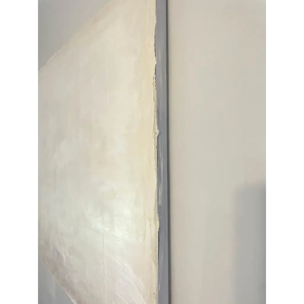 ‘Innocence’ – Close-up of textured white and beige abstract artwork, highlighting subtle movement and delicate layering – Caroline Adrienne Art