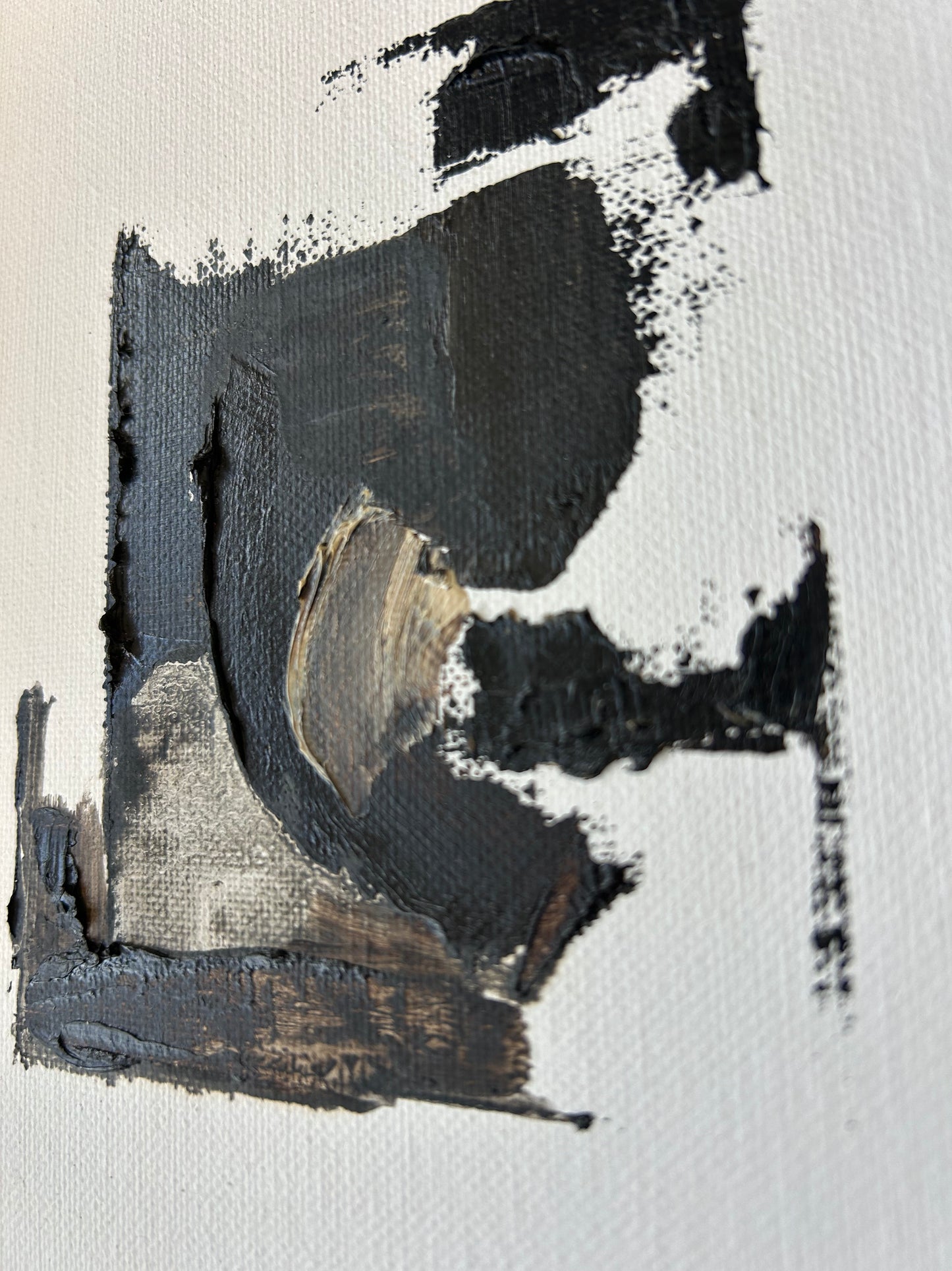 Abstract black and gray painting on a textured white background
