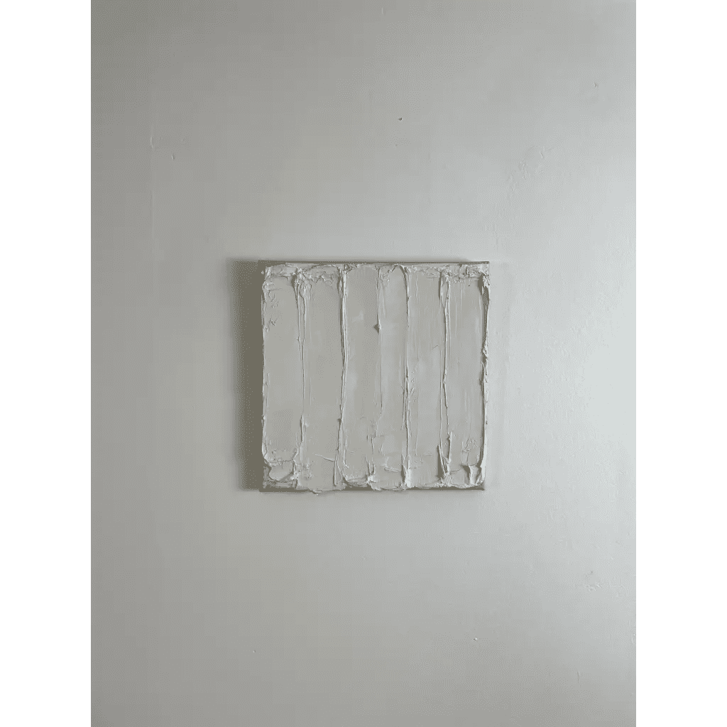 Athena: A crisp, white abstract artwork with tactile texture, characterized by subtle layering and a refined, minimalist aesthetic.
